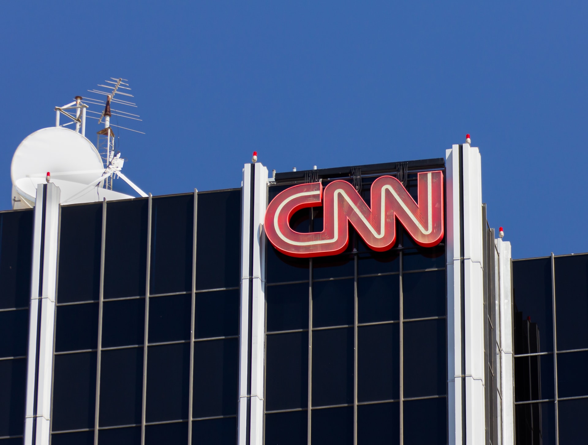 HOLLYWOOD, CA/USA - MAY 2, 2015: CNN building exterior and logo. Cable News Network (CNN) is an American basic cable and satellite television channel that is owned by Time Warner.